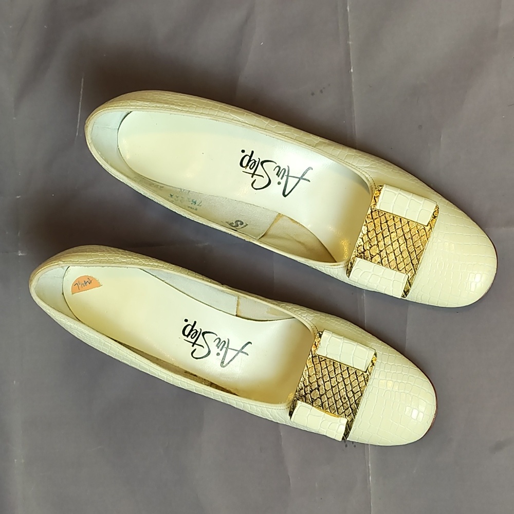 Air Step kitten heel cream animal print pumps